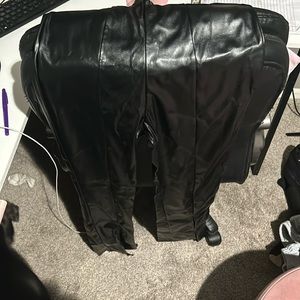 Black pleather pants with slits on bottom